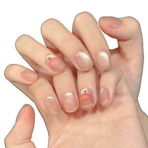Pink cat-eye press-on nails with 3D handmade apple design and sparkling finish