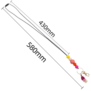 Macro shot showing 580mm colorful silicone beads lanyard with tassel and gold hardware