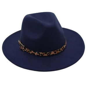 Detail of navy blue felt fedora hat featuring leopard print band and golden buckle