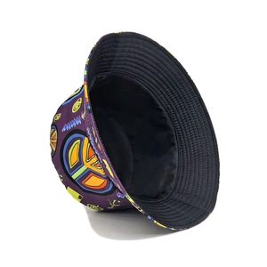 Purple bucket hat with colorful peace sign graffiti patterns and black lining