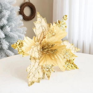 Detailed close-up of champagne gold poinsettia flower with sequins for Christmas tree decor