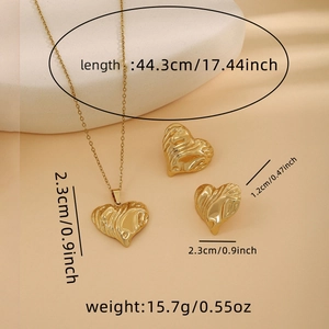 Detailed view of golden heart jewelry set with molten texture and size dimensions