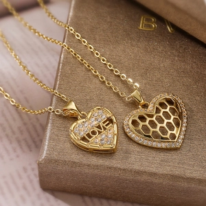 18K gold plated copper necklaces with heart LOVE pendants on a bronze gift box