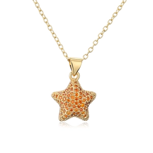 Luxury 18K gold plated starfish necklace with orange micro zircon pavé on white background