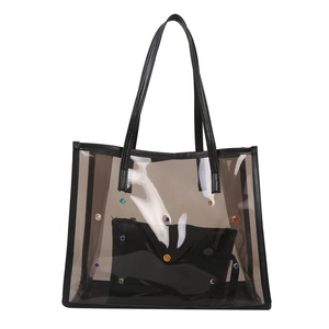 Modern transparent PVC tote bag with colorful rivets and black interior pouch