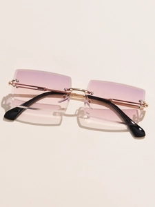 Close-up of pink gradient rimless square sunglasses with gold metal temples and details