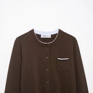 Dark brown knitted cardigan with contrast blue trim and button closure on white background