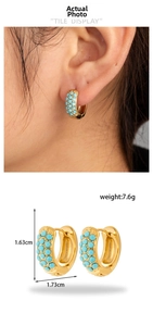 Detail view of turquoise beaded hoop earrings in gold plating with size dimensions