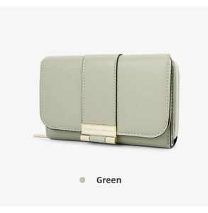 Detail view of green long wallet with textured faux leather and gold metal buckle