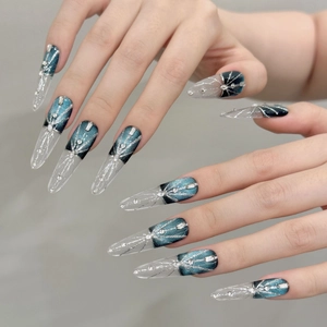 Dark blue-green cat-eye press-on nails with silver glitter lines and rhinestones