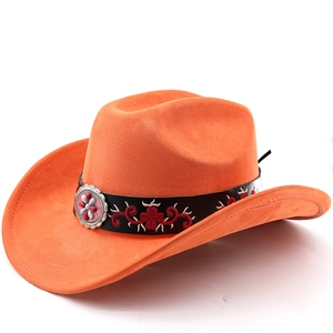 Detail of orange suede cowboy hat featuring red floral embroidery and silver buckle