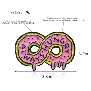 Pink infinity donut enamel pin with Always Hungry text and size dimensions