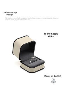 Detail of elegant PU leather jewelry box with a classic six-prong solitaire diamond ring