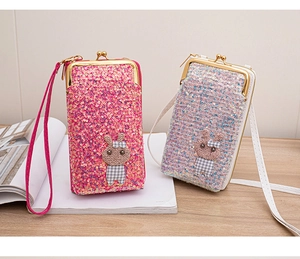 Pink and silver sequin crossbody bags with cute rabbit plush charms and metal clasps
