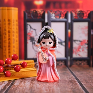 Detailed resin figurine of a Chinese lady in red hooded cloak playing the Pipa lute