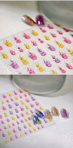 Macro shot of M-1009 holographic flame nail stickers with 3D colorful gradient effect