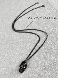 Detail showing the 55+5cm length of this black punk skull pendant necklace for men