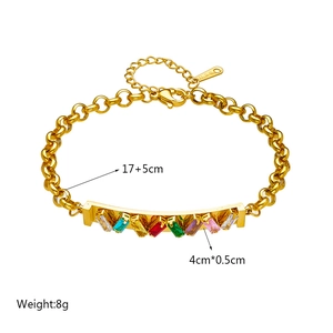 Gold chain bracelet with rectangular colored zircons on white background, 17+5cm length