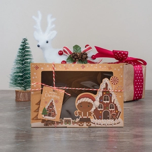Kraft Christmas gift box with clear window, gingerbread prints, and festive ornaments