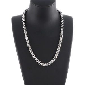Polished silver stainless steel box chain necklace for men on a black mannequin display