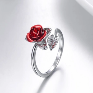 Detailed side view of silver open ring with a red 3D rose and textured leaf design