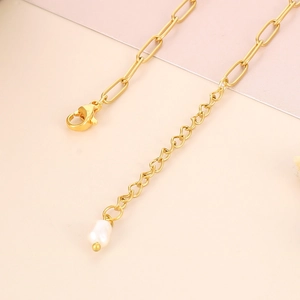 Collier soleil en acier titane doré avec pendentif palmier et fermoir mousqueton