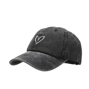 Vintage washed dark grey cotton baseball cap featuring white heart embroidery on front