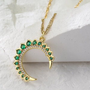 18K gold plated moon pendant necklace with green emerald zircons on white stone base