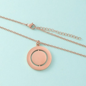 Minimalist rose gold stainless steel necklace with rotating geometric disk pendant