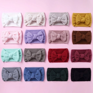 Knitted waffle fabric baby headbands with large bows in sixteen assorted colors