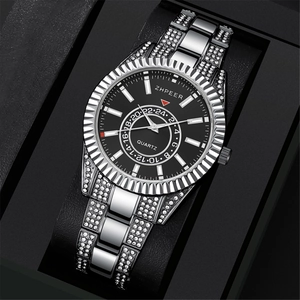 Detail of silver diamond-set watch band and black dial in a premium display box