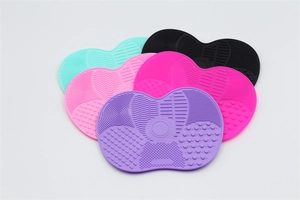 Silicone makeup brush cleaning mats in five colors with various textures for deep cleaning