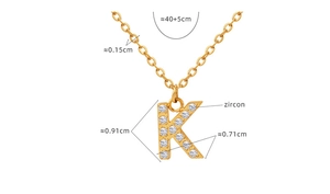 Detail shot of K-letter pendant with zircon inlay and product dimension specifications