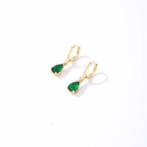 Elegant gold-tone hoop earrings with pear-cut green gemstone drops in a minimalist style