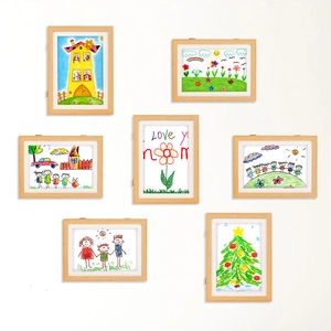 Wall-mounted kids art frames in natural wood finish showing horizontal and vertical layouts