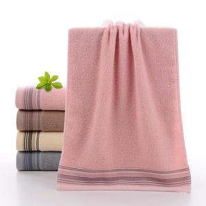 Absorbent pure cotton towels in pink, brown, beige, and gray with a soft looped texture