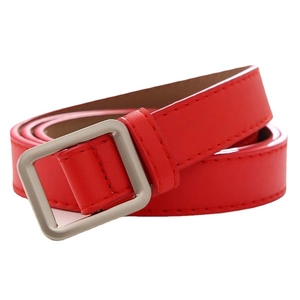 Classic red leather belt for women with elegant square metal buckle on white background