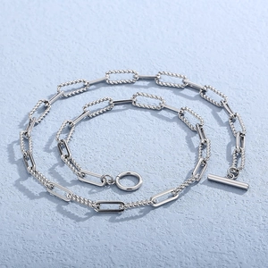 Hip hop silver stainless steel box chain necklace with OT toggle clasp on blue background