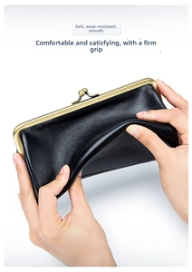 Close-up showing the soft texture and flexible leather of this vintage evening clutch bag