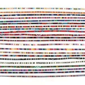 Macro view of colorful Bohemian braided eyewear chains with ethnic woven patterns