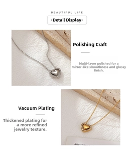Detailed macro view of polished heart pendant necklace with vacuum-plated finish