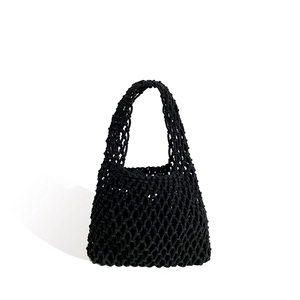 Minimalist black hand-woven cotton rope tote bag with openwork mesh and single handle