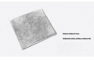 Close-up of a slim bifold men's wallet featuring refined lychee pattern leather texture