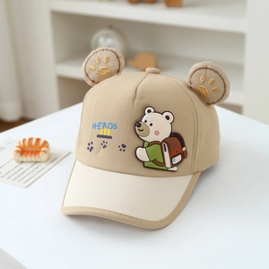 Close-up of khaki cartoon bear baseball cap with 3D ears and adjustable Velcro strap