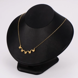 304 Stainless steel necklace with five realistic matte gold butterfly pendants on a display