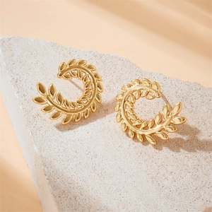 Golden wheat leaf stainless steel earrings on stone base with warm lighting effect