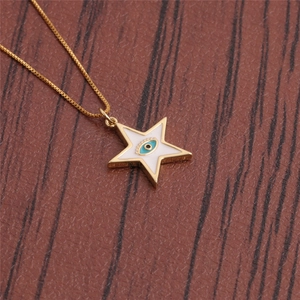 Gold box chain necklace with a white enamel star pendant featuring an evil eye motif