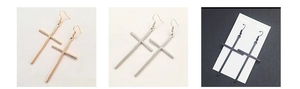 Detailed views of punk cross drop earrings in gold, silver, and black metal finishes