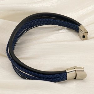 Multilayer braided leather men's bracelet with navy and black cords and steel clasp