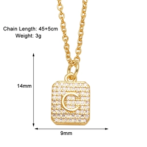 Detail showing 14x9mm gold rectangular pendant with letter C and pavé cubic zirconia